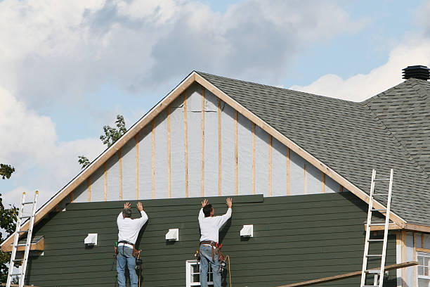 Professional Siding technician working in Empire, OH